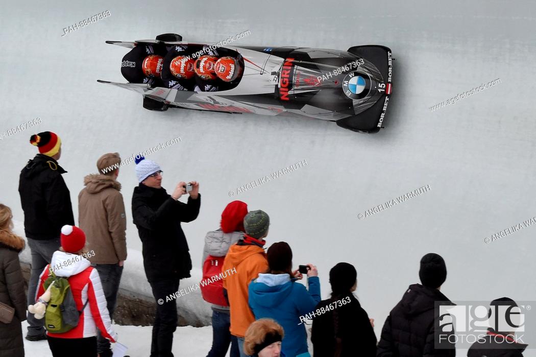Stock Photo: Benjamin Maier, Stefan Laussegger, Markus Sammer and Ion Danut Moldovan from Austria in action during the 3rd run of the four-man bobsleigh race in Schoenau am.