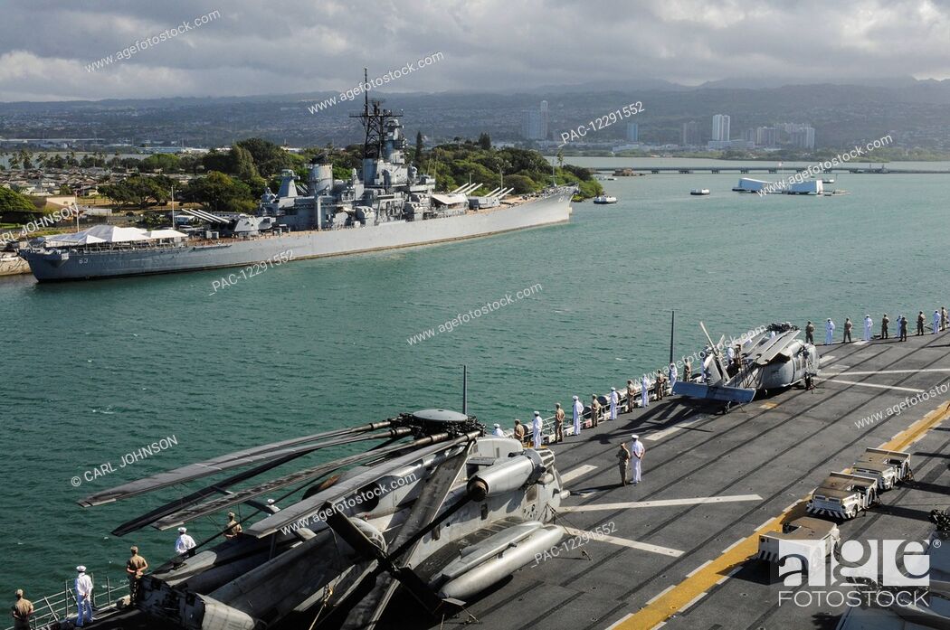 Stock Photo: Sailors and Marines man the rails in dress uniform as a ship passes by the USS Missouri (BB-63) in Pearl Harbor; Oahu, Hawaii, United States of America.