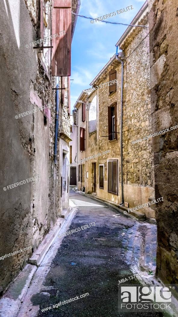 Stock Photo: Village alley in Saint Chinian in spring.