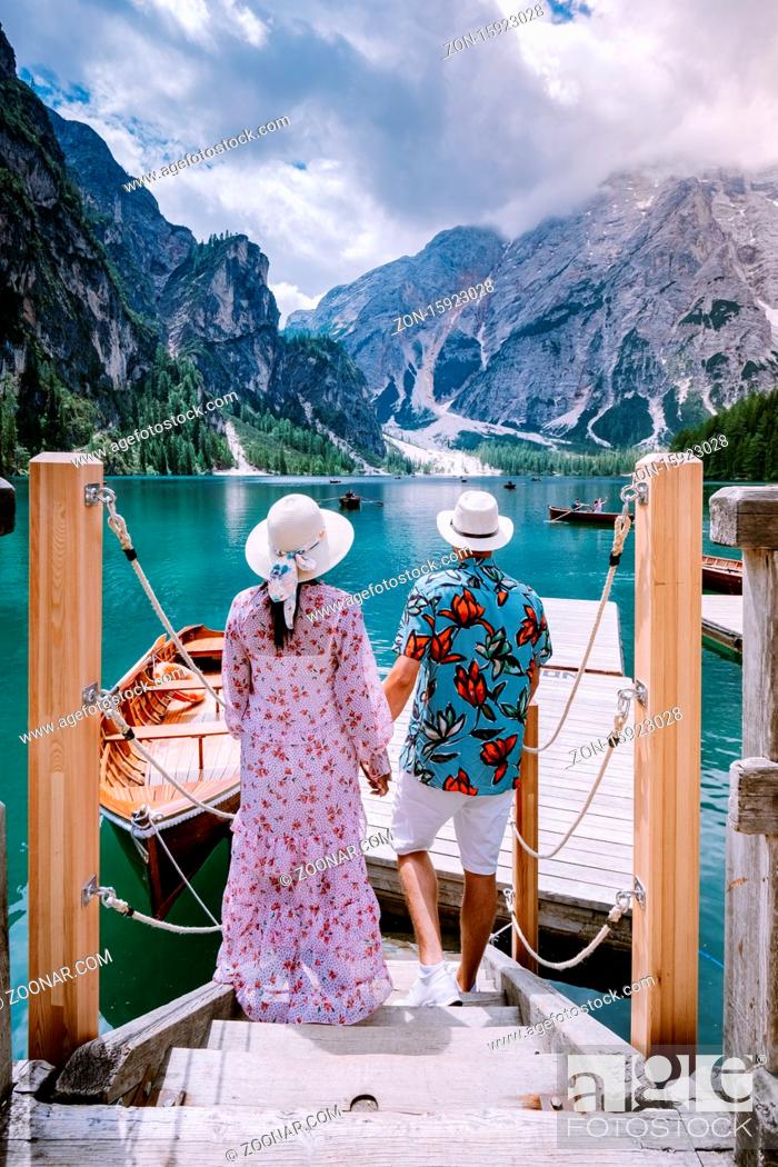 Stock Photo: couple visit the famous lake Lago Di Braies Italy, Pragser Wildsee in South Tyrol, Beautiful lake in the italian alps, Lago di Braies.