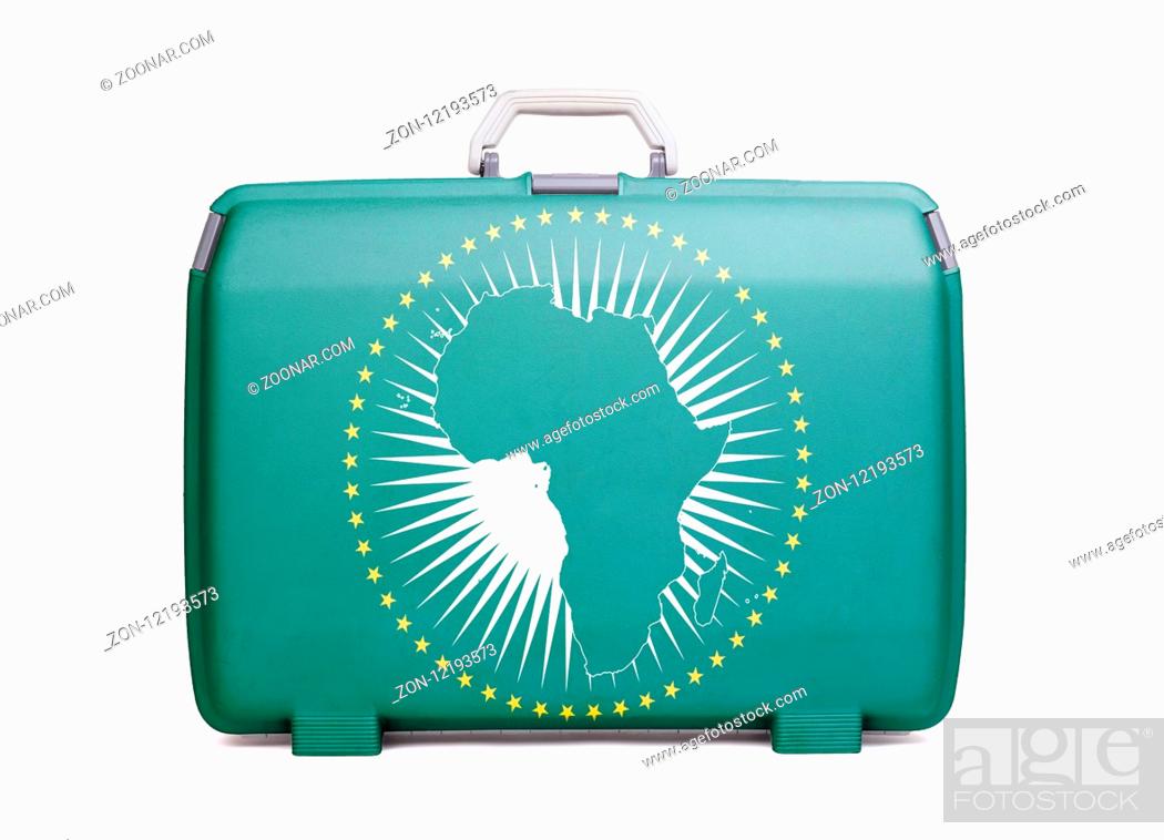 Stock Photo: Used plastic suitcase with stains and scratches, printed with flag - African Union.