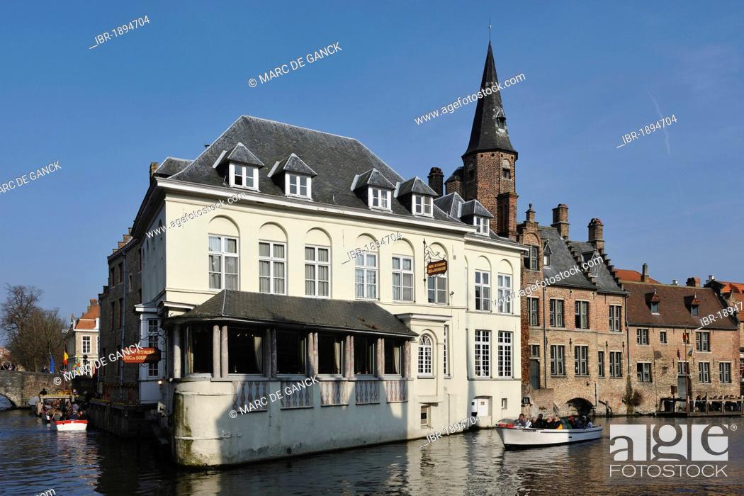 Stock Photo: Boats on the Dijver near Hotel Duc de Bourgogne, Bruges, Flanders, Belgium, Europe.