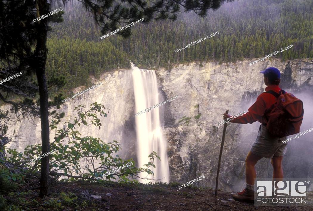 Stock Photo: Hiker at Hunlen Falls, Tweedsmuir Park, Turner Lake Trail, British Columbia, Canada.