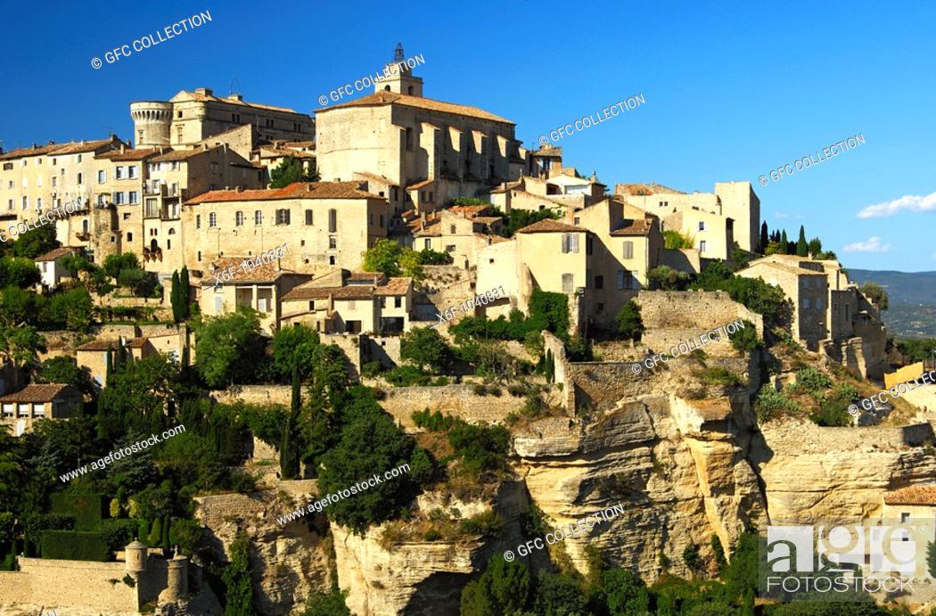 Stock Photo: Gordes with the Château de Gordes and the Saint-Firmin church on the Monts de Vaucluse hill, Provence, France.