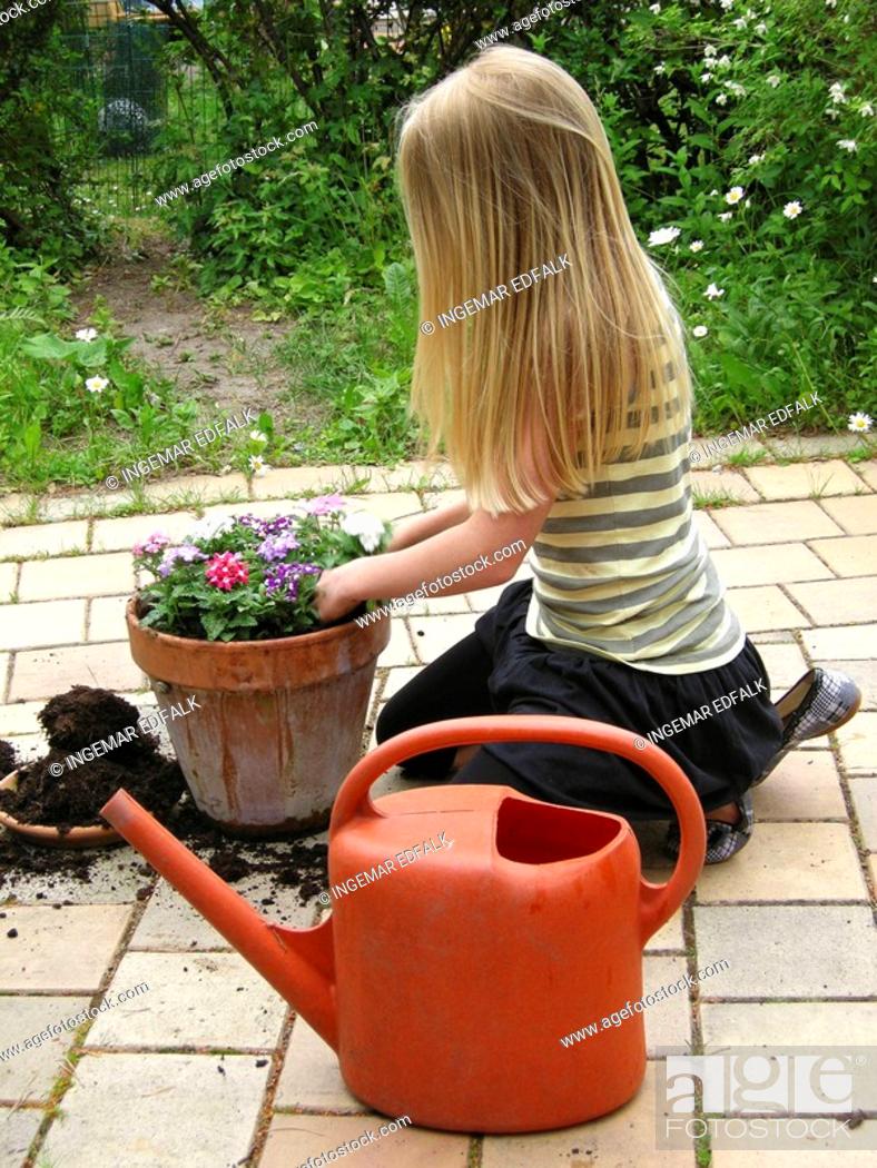 teenage girls doing yard work