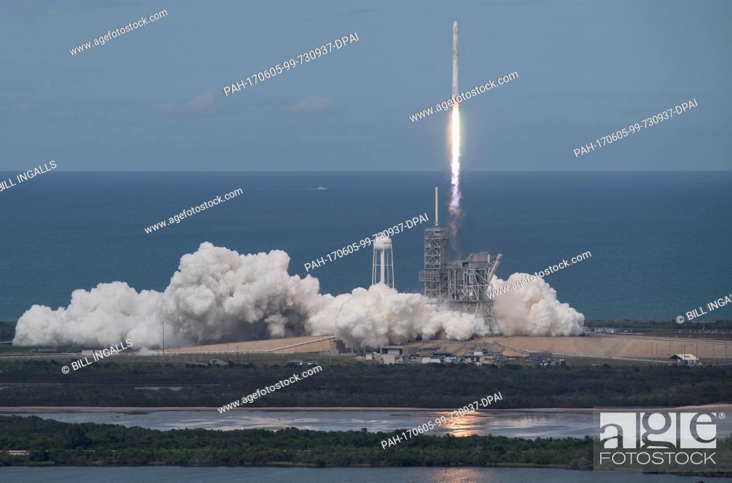 Stock Photo: The SpaceX Falcon 9 rocket, with the Dragon spacecraft onboard, launches from pad 39A at NASAÂ·s Kennedy Space Center in Cape Canaveral, Florida, Saturday.