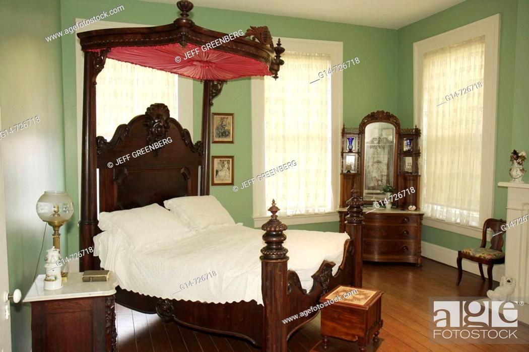 Stock Photo: Alabama, Montgomery, Old Alabama Town, historic buildings, Ordeman House, 1850s, bedroom, four poster bed, canopy, dressers, furniture, antique,.