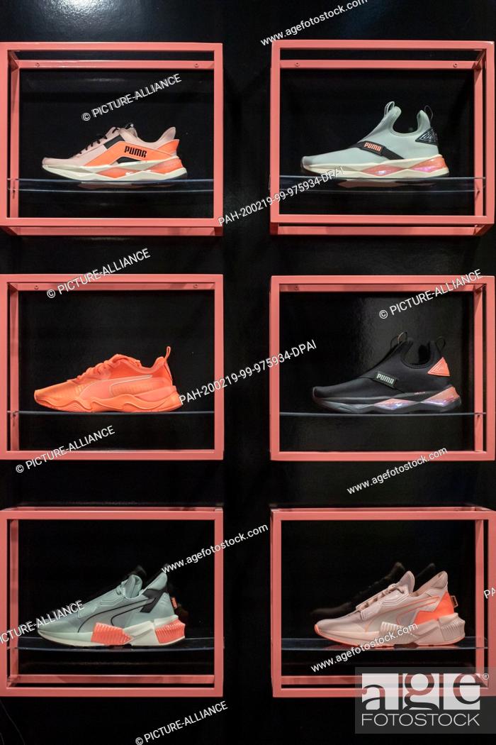 Stock Photo: 19 February 2020, Bavaria, Herzogenaurach: Shoes from the sports equipment manufacturer Puma SE are on a shelf. The company presents its annual figures for 2019.