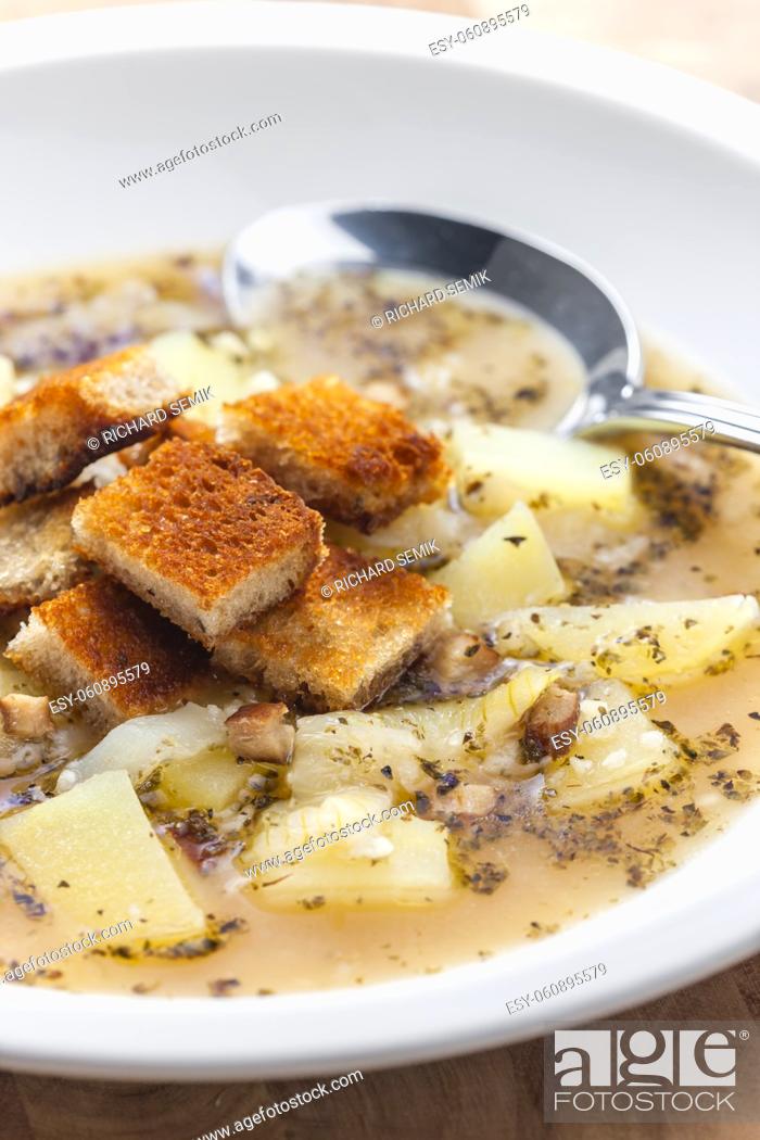 Stock Photo: garlic soup with toast bread.