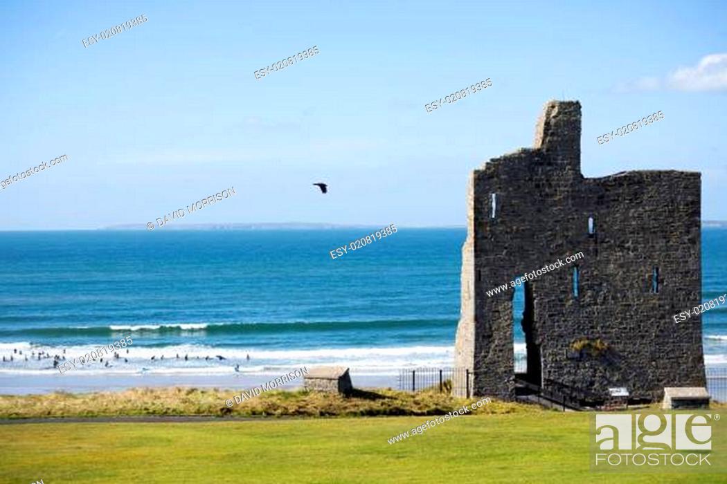 Stock Photo: ballybunion castle ruins with surf school.