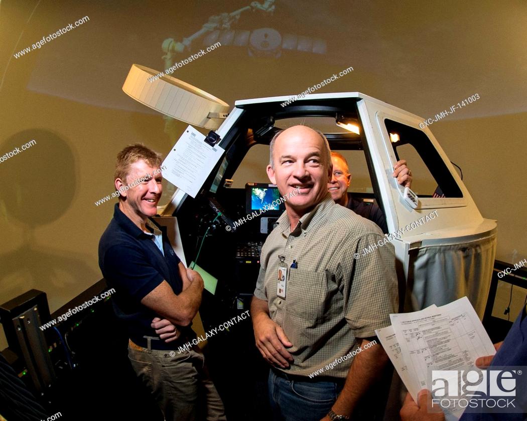 Stock Photo: European Space Agency astronaut Timothy Peake (left), Expedition 4647 flight engineer; NASA astronaut Jeff Williams (right).