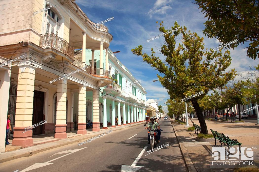 Stock Photo: Motorbike in the main avenue Prado at the town center, Cienfuegos, Cienfuegos Province, Cuba, West Indies, Central America.