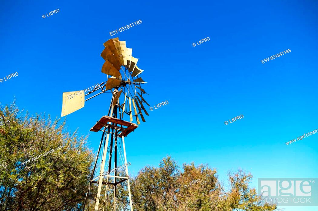Stock Photo: blur south africa windmill turbine technology in the national park.