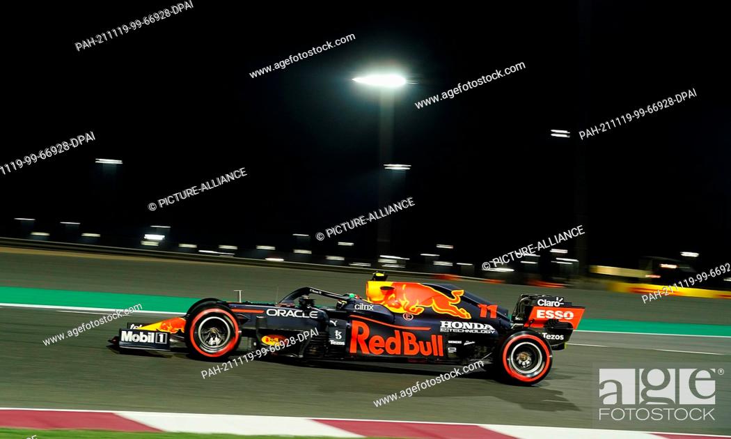 Stock Photo: 19 November 2021, Qatar, Losail: Motorsport: Formula 1, ahead of the Qatar Grand Prix: Mexican driver Sergio Perez of the Red Bull Racing team steers his car.