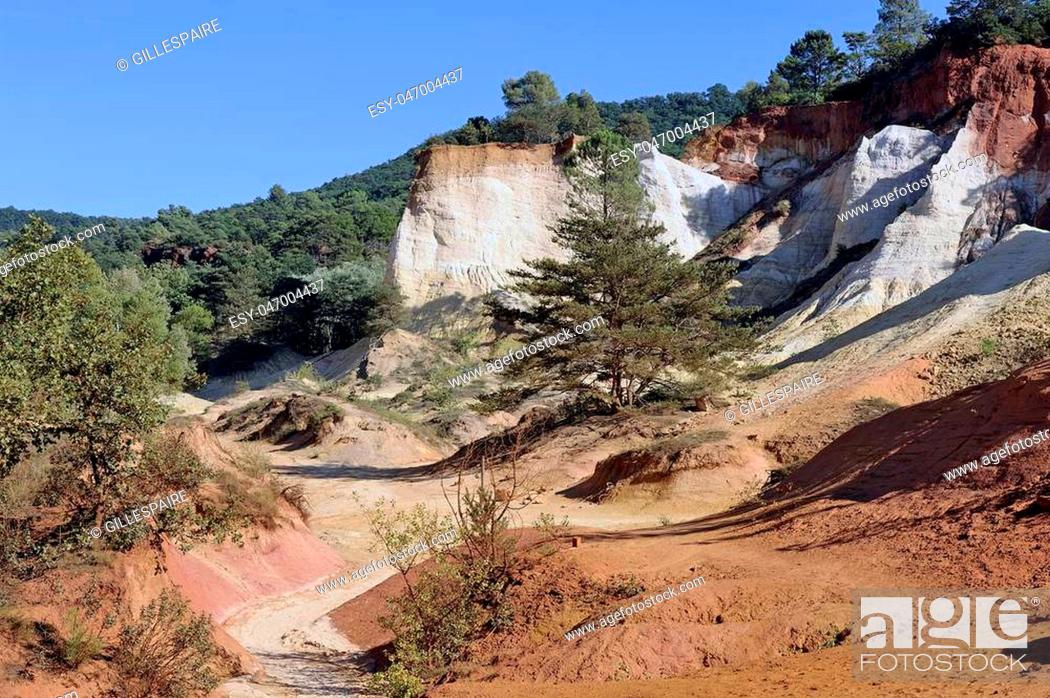 Stock Photo: red landscape dug by six generations of miners ocher Colorado Provencal at Rustrel in the south of France.