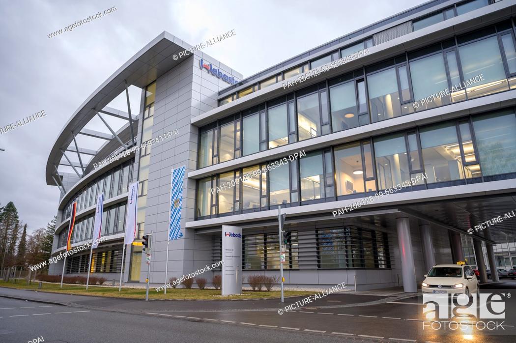 Stock Photo: 28 January 2020, Bavaria, Stockdorf: The main building of the Webasto company. In Germany, an infection with the novel coronavirus has been confirmed for the.