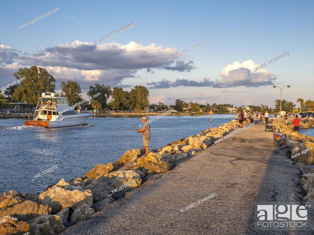 Stock Photo: Late afternoon sun on the Jetty in Venice Florida.