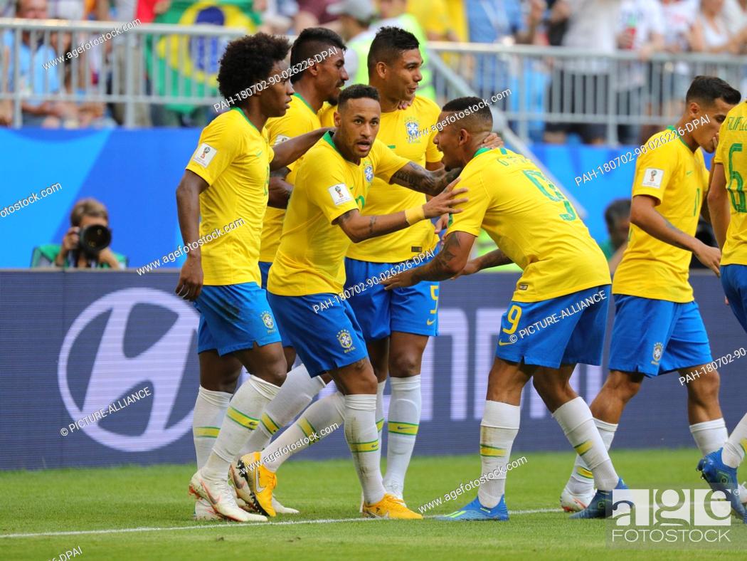 Stock Photo: 02 July 2018, Russia, Samara: Soccer, World Cup 2018, Final round - round of 16: Mexico vs. Brazil at the Samara stadium: Brazil's Neymar (C) celebrating his.