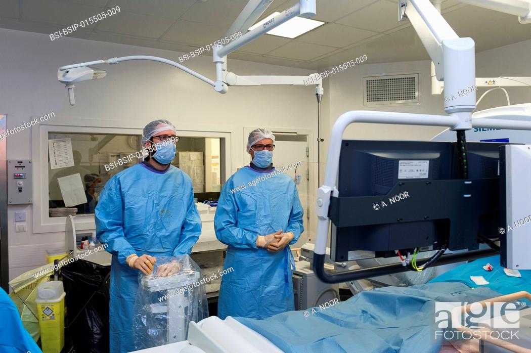 Stock Photo: Reportage in the interventional scanner service in Pasteur 2 Hospital, Nice, France. Vertebroplasty- cementoplasty operation to treat a vertebral facture.