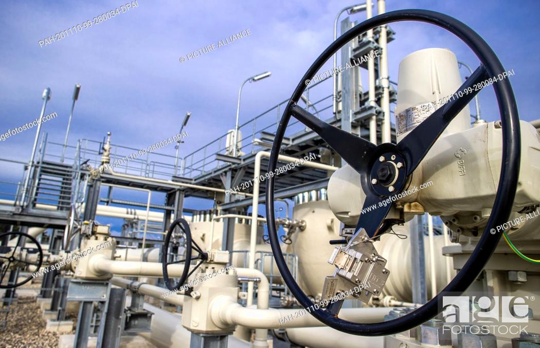 Stock Photo: 05 November 2020, Mecklenburg-Western Pomerania, Lubmin: Piping systems and shut-off valves are installed at the gas receiving station of the Nord Stream Baltic.