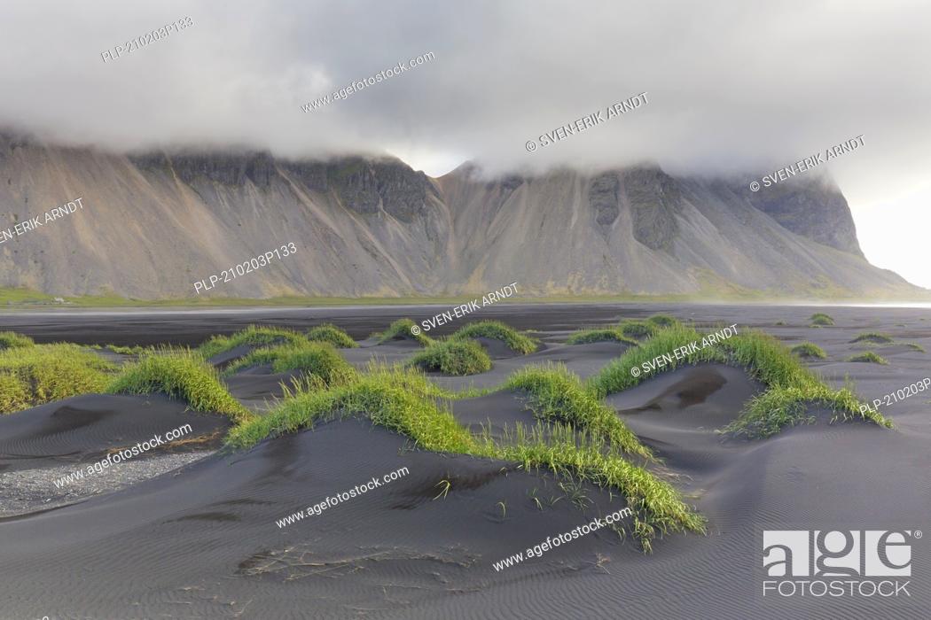 Stock Photo: Vestrahorn / Vesturhorn, scree mountain made of gabbro and granophyre rocks, part of the Klifatindur mountain range at Stokksnes, Iceland.