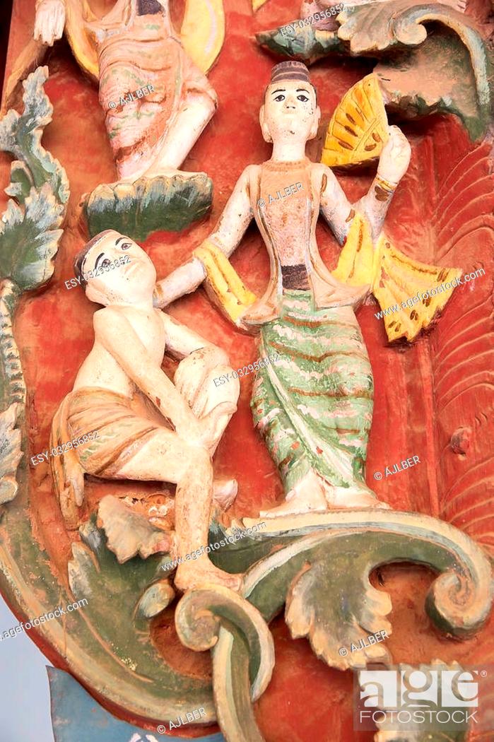 Stock Photo: Details of the wooden bas-relief in one small temple at the Shwezigon Pagoda, Nyaung U village, Bagan, Myanmar. Shwezigon Pagoda is a Buddhist temple ubicated.