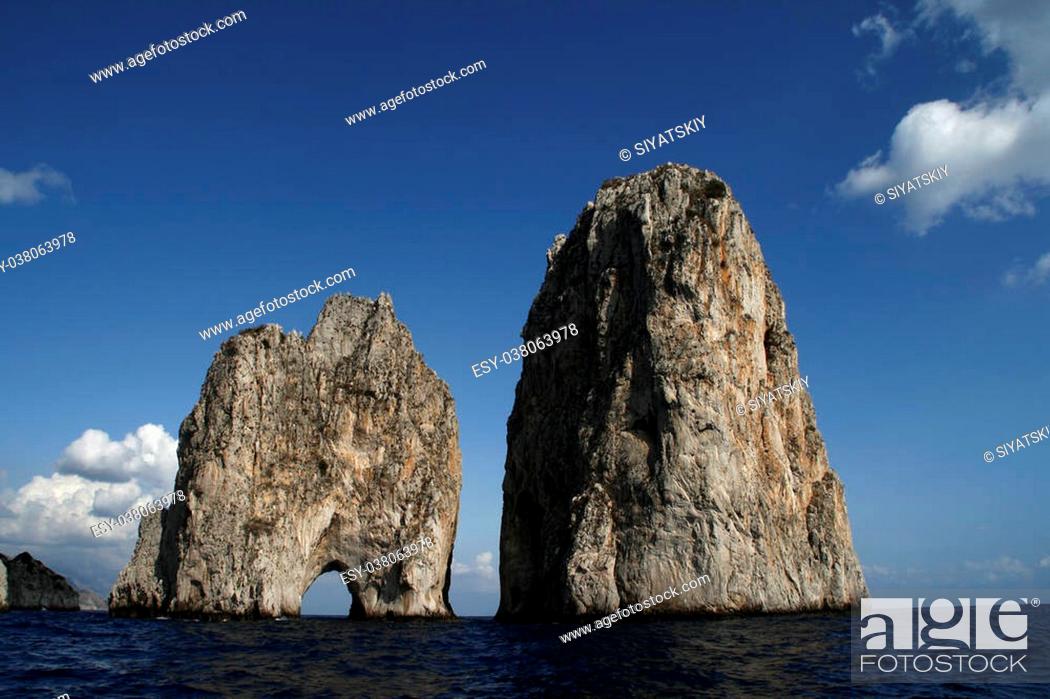 Stock Photo: Faraglioni are the three stacks located off the island of Capri.