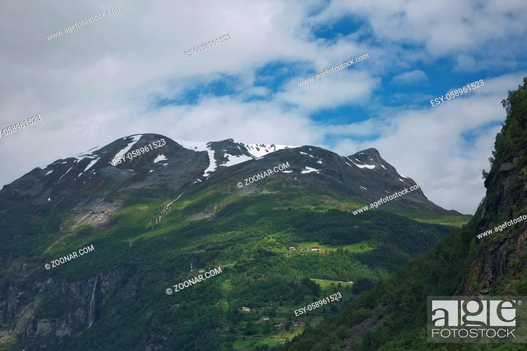 Photo de stock: Geiranger fjord, Beautiful Nature Norway. It is a 15-kilometre (9.3 mi) long branch off of the Sunnylvsfjorden, which is a branch off of the Storfjorden (Great.