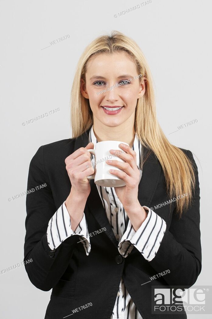Stock Photo: Business woman drinking coffee.