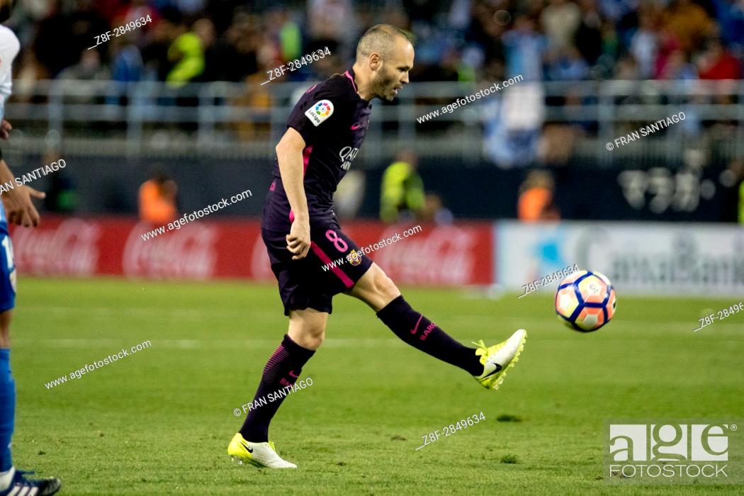Stock Photo: Andres Iniesta. La Liga Santander match day 31 game between Malaga CF and FCBarcelona played in La Rosaleda Stadium, Malaga, Spain.