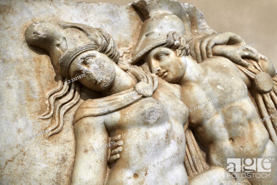Stock Photo: Detail of a Roman Sebasteion relief sculpture of Achilles and a dying Amazon, Aphrodisias Museum, Aphrodisias, Turkey. Against an art background. .