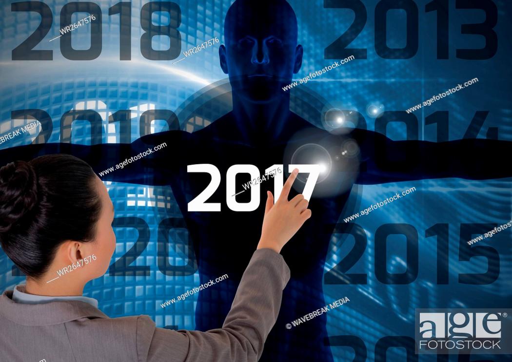 Stock Photo: Woman touching 2017 on 3D digitally generated human body silhouette.
