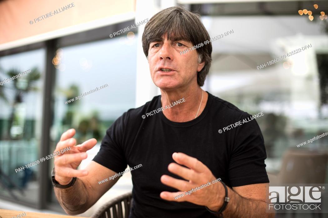 Stock Photo: 07 June 2018, Italy, Eppan: Soccer, national squad, Germany, training camp ahead of the soccer World Cup Russia 2018. Germany head coach Joachim Loew speaking.