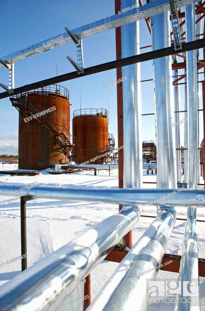 Stock Photo: Tank storage crude Oil in winter landscape.