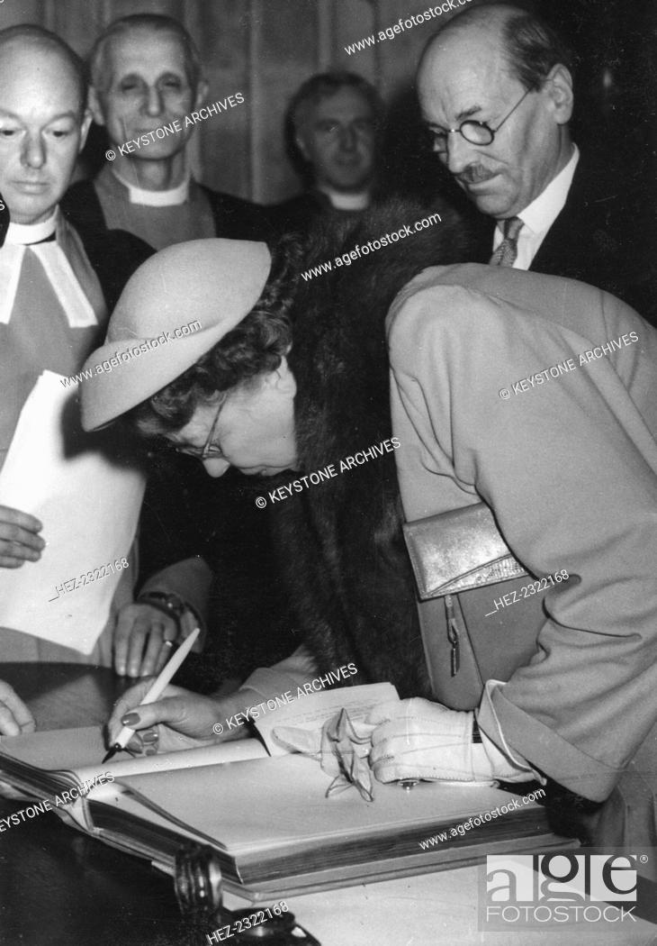 Stock Photo: Eleanor Roosevelt (1892-1962) signs the visitors book at Westminster Abbey, London, 1948. Eleanor Roosevelt attends the unveiling of her husband's memorial.