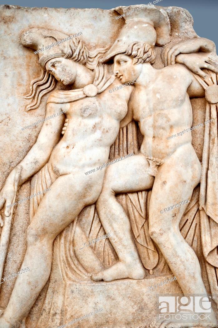 Stock Photo: Roman temple freize relief sculpture of Achilles and a dying Amazon, Aphrodisias Museum, Aphrodisias, Turkey. Achilles supports the dying Amazon queen.