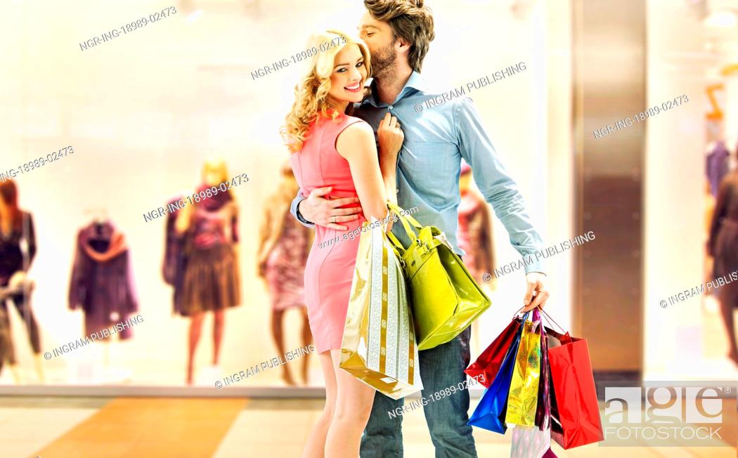 Stock Photo: Couple enjoying leisure in the shopping mall.