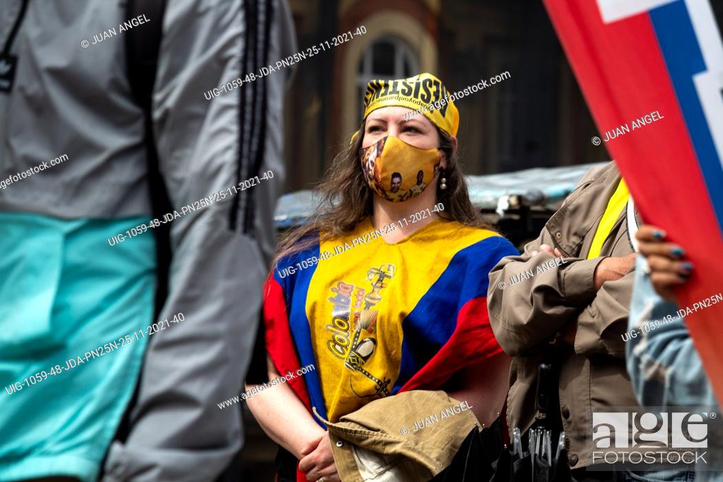 Stock Photo: People take part with Colombian flags and chants during demonstrations called by work unions against the government of president Ivan Duque Marquez, in Bogota.