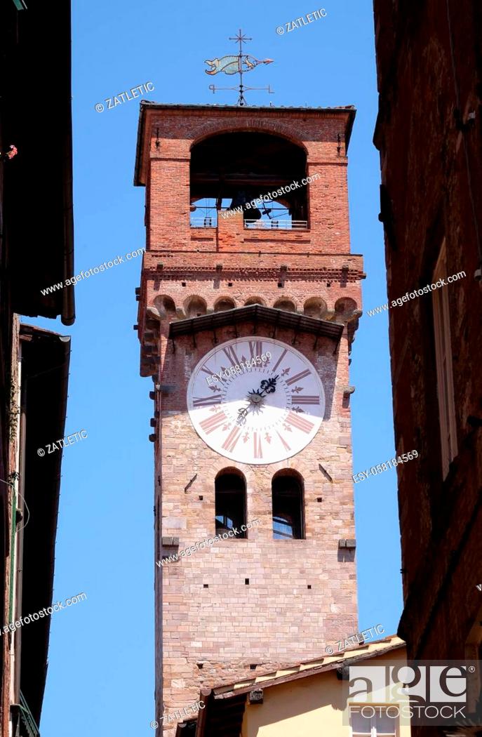 Stock Photo: Torre dell'Orologio, Stone Bell Tower (Campanile) topped with brick arch and clock with roman numerals in Lucca, Italy.