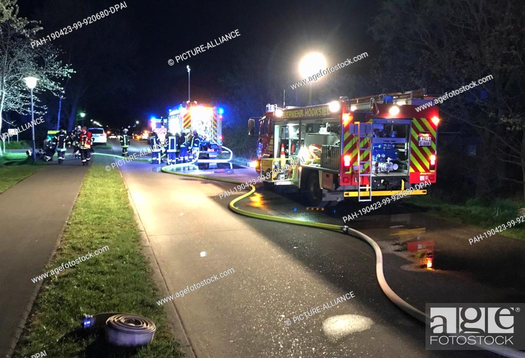 Stock Photo: 23 April 2019, Lower Saxony, Wangerland: The fire brigade is on duty in the event of a fire in a home for the disabled. Two residents were injured in the fire.