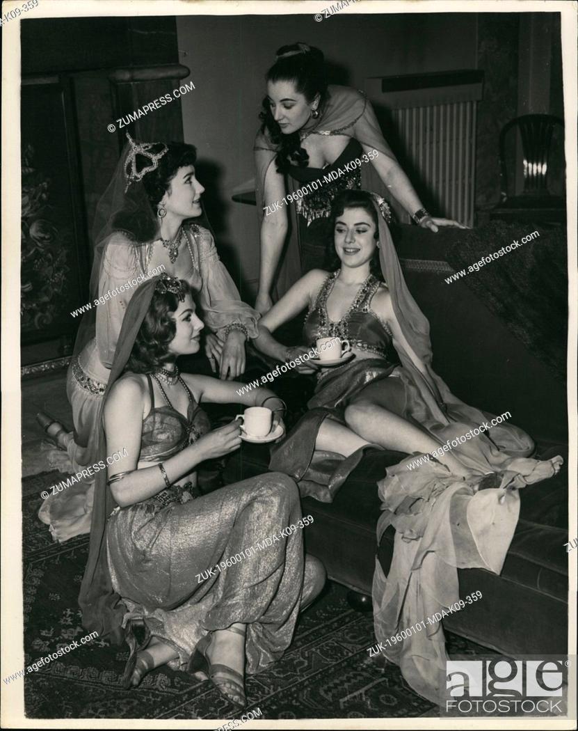 Stock Photo: Jan 1, 1960 - Girls Attend Premiere In Harem Costume: The young lovelies who appear in the new film 'You Know What Sailors Are', this evening drove to the Odeon.