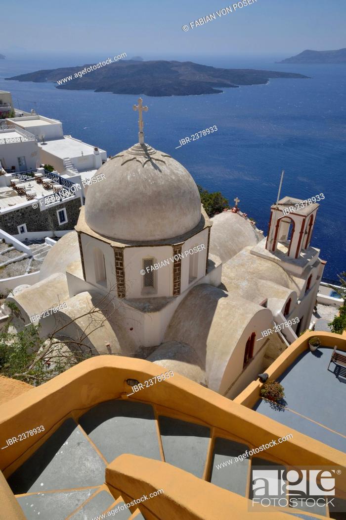 Stock Photo: View from the crater rim across the rooftops of Firá or Thira into the Caldera, Ágios Ioánnis church at front, Santorini, Cyclades, Greek Islands, Greece.