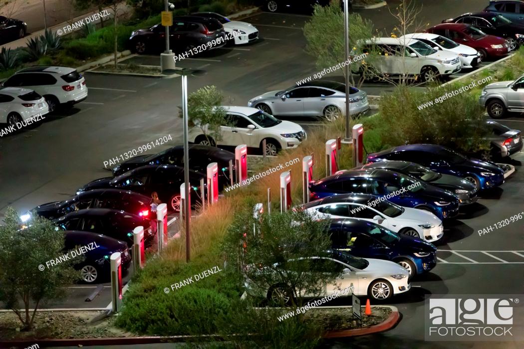 Stock Photo: Tesla Supercharger at the Qualcomm parking lot in Sorrento Valley, where many high tech, biotech, and IT companies are located, in Febuary 2018.