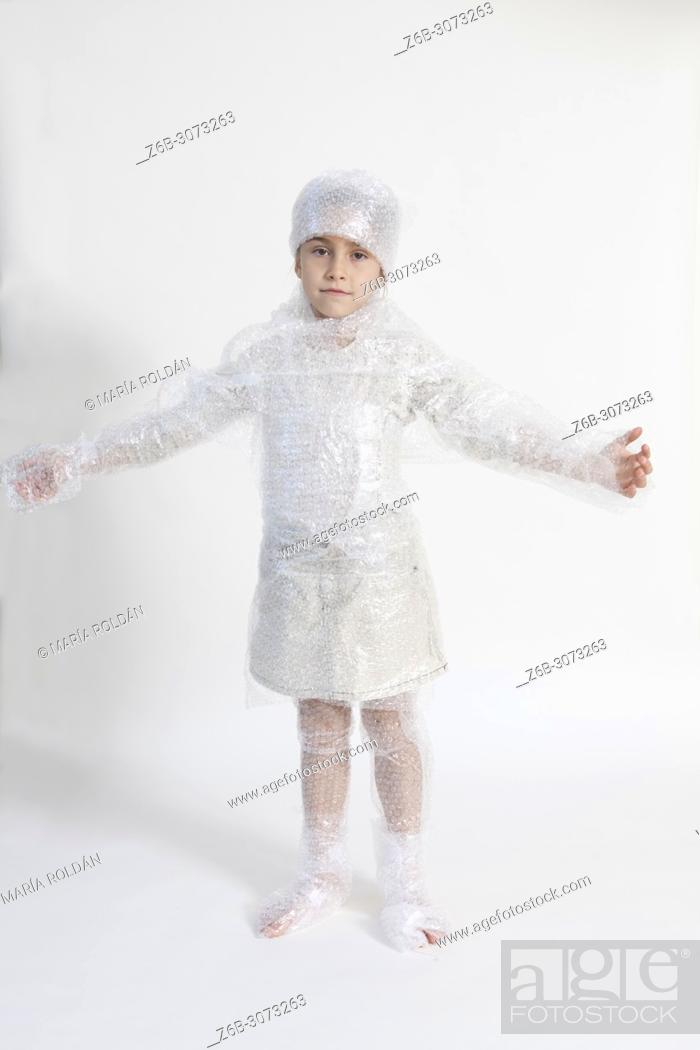 Stock Photo: little girl wearing bubble wrap.