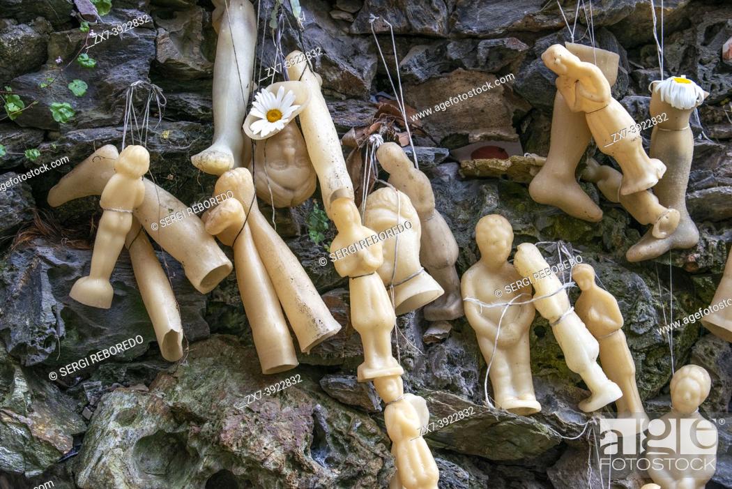 Stock Photo: Wax body parts votive offerings at the Lourdes Grotto in the Convent of the Concepcionistas, a 1925 scale reproduction of the French grotto.