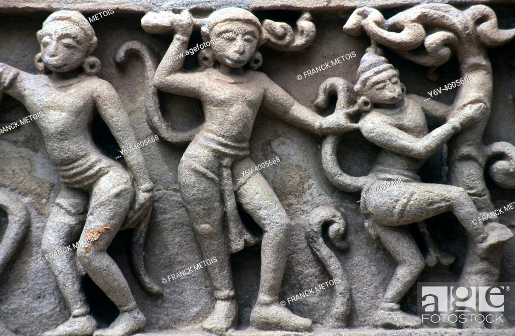 Stock Photo: Bas relief depicting a scene from the hindu mythology ( Shamlaji, Gujarat, India). Carving on the outer wall of a 15th-16th centuries temple dedicated to Vishnu.