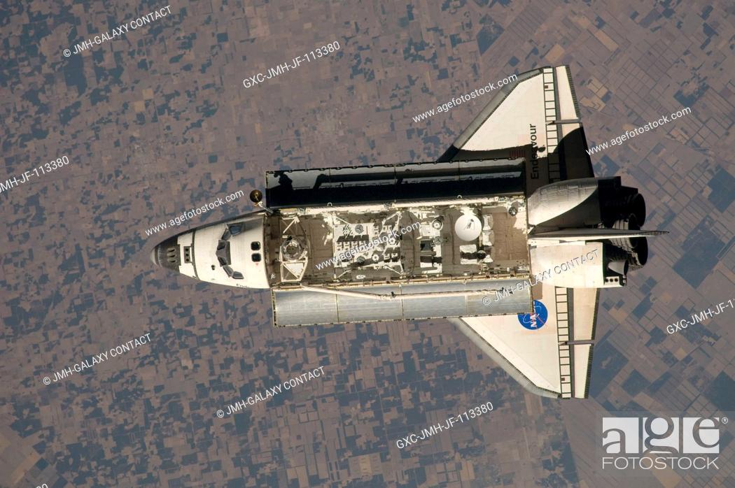 Stock Photo: This view of the Space Shuttle Endeavour was one of a series provided by an Expedition 20 crewmember prior to and during a survey of the approaching vehicle.