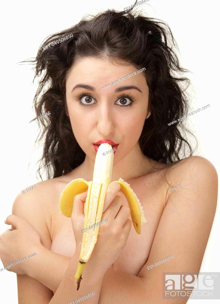 Beautiful woman eating banana white background, Foto de Stock, Low Budget Royalty Free Pic. | agefotostock