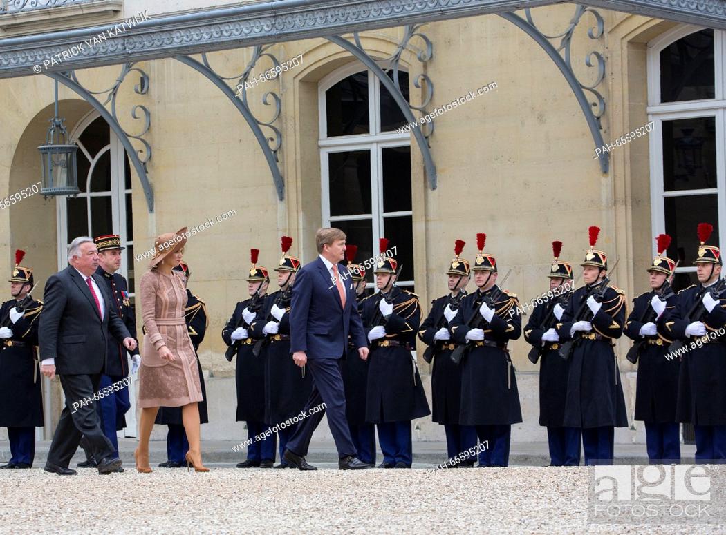 Stock Photo: King Willem-Alexander and Queen Maxima of The Netherlands visit chairman of the senate Gerard Larcher at Paleis du Petit Luxembourg in Paris, France.