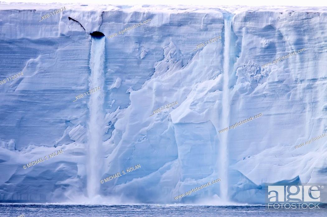 Stock Photo: Views of Austfonna, an ice cap located on Nordaustlandet in the Svalbard archipelago in Norway  It is the largest ice cap by area and with 1.